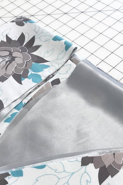Fox and Shrew deadstock cotton fabric on the cutting table silk lining handmade sustainable